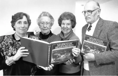 Picture of Mary and Isabel Champion, Laura Weaver and Frank Johnson. Together, and supported by John Lunau, they were the editors, researchers and authors of “Markham 1793-1900” & “Markham Remembered”, the first comprehensive histories. Credit: Weaver Collection, 1988.
